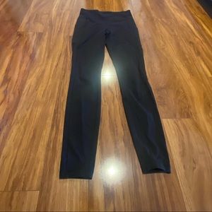 Lululemon size 6 black leggings with pocket on side.